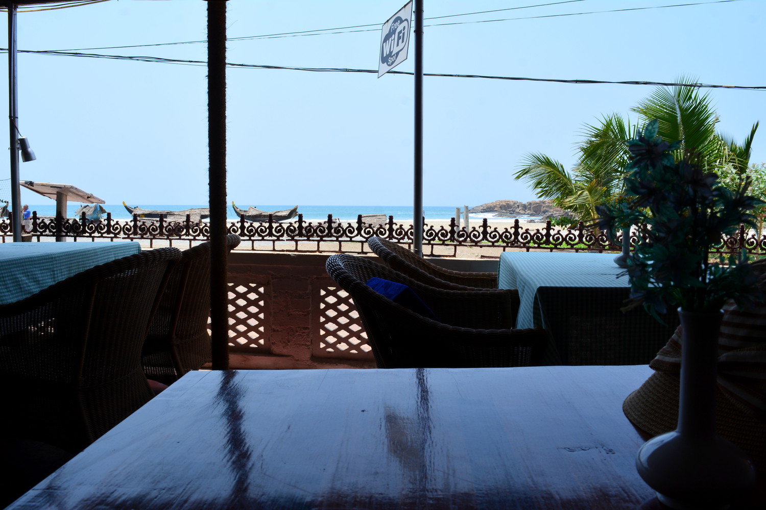 View of sea beach from a seaside restaurant