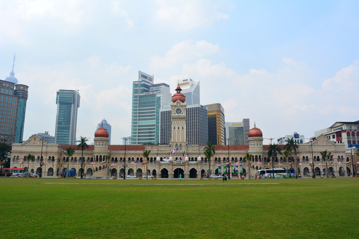 Sultan Abdul Samad Building that looks like a palace with green lawn in front of it