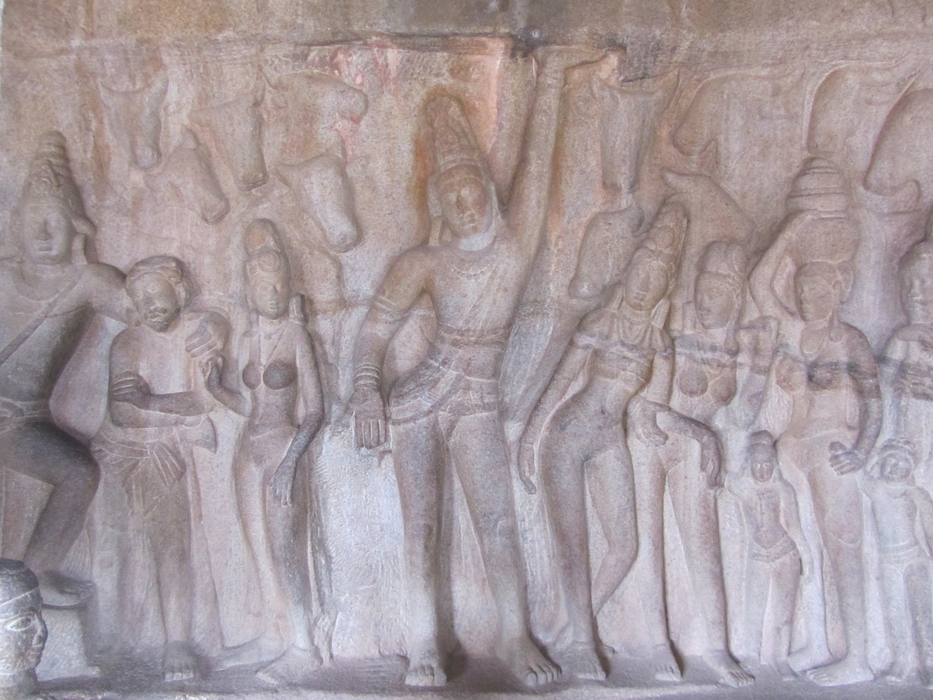 A relief on a rock face of Krishna Cave Temple depicting Krishna lifting the mythical Govardhana Hill